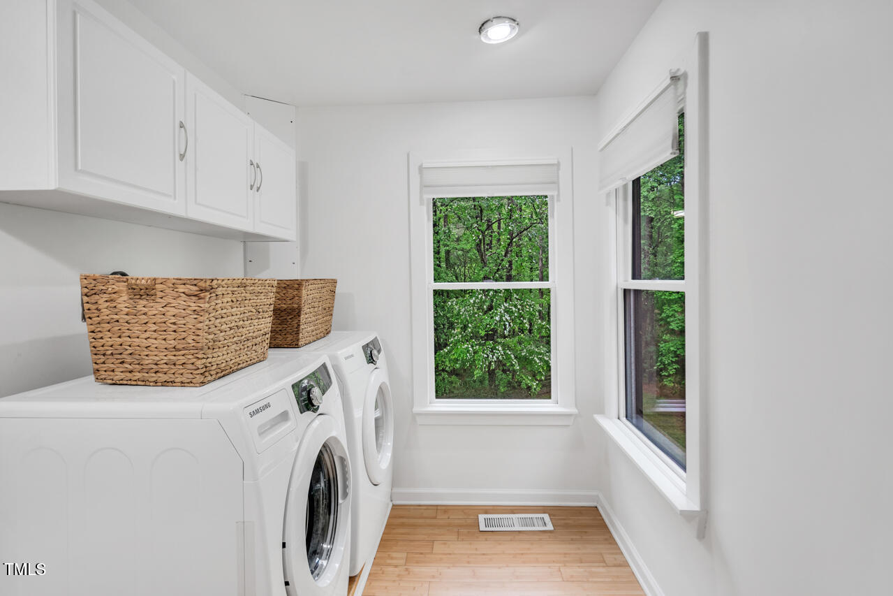 121 Lady Bug Lane Chapel Hill, NC 27516 - Photo 30 of 36 a utility room with dryer and washer