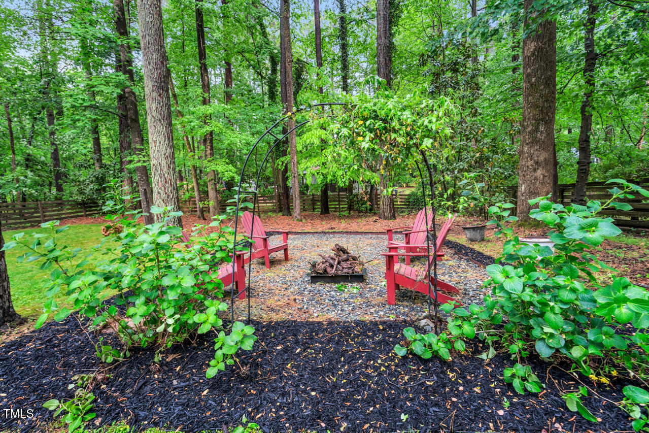 121 Lady Bug Lane Chapel Hill, NC 27516 - Photo 32 of 36 a view of a garden with sitting area