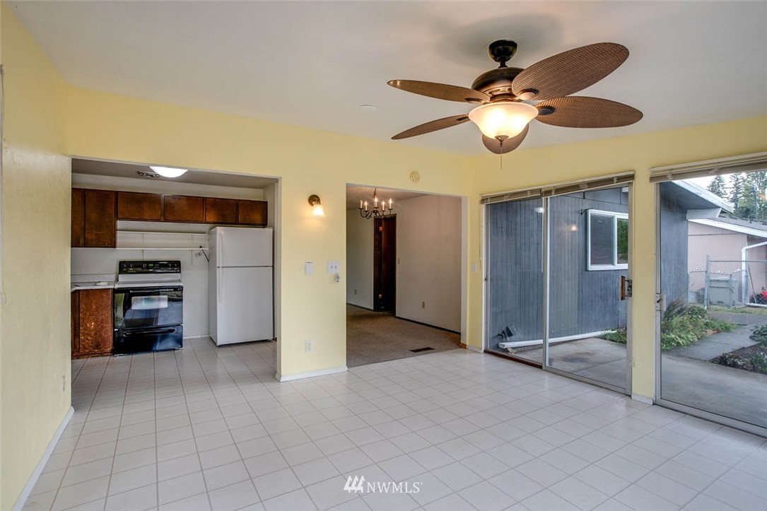4625 Northeast 23rd Street Renton, WA 98059 - Photo 13 of 24 a view of an empty room with a kitchen
