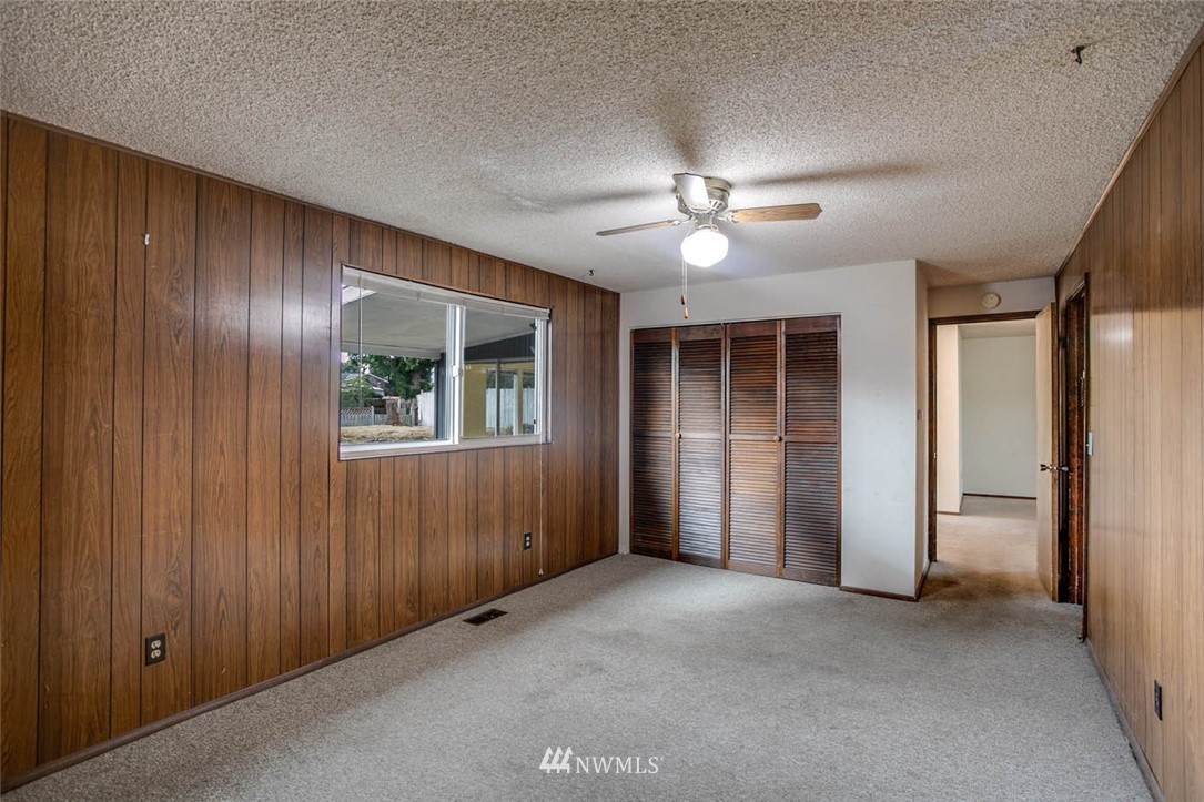 4625 Northeast 23rd Street Renton, WA 98059 - Photo 15 of 24 a view of empty room with a ceiling fan