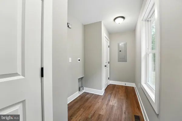 a view of wooden floor in an empty room