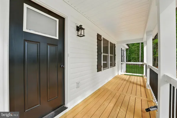 a view of a house with a porch