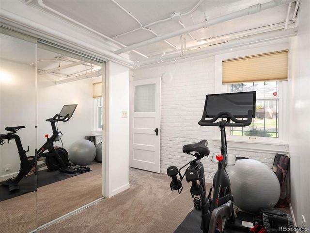 a view of a room with gym equipment