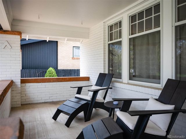 a view of a chairs and table in a room