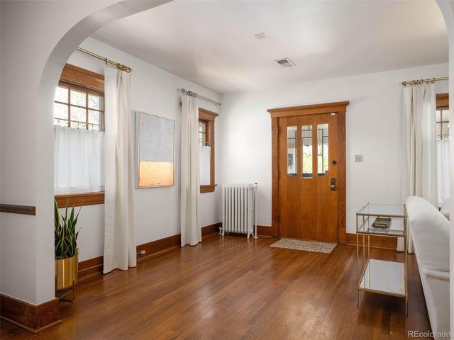 a view of livingroom with hardwood floor and window