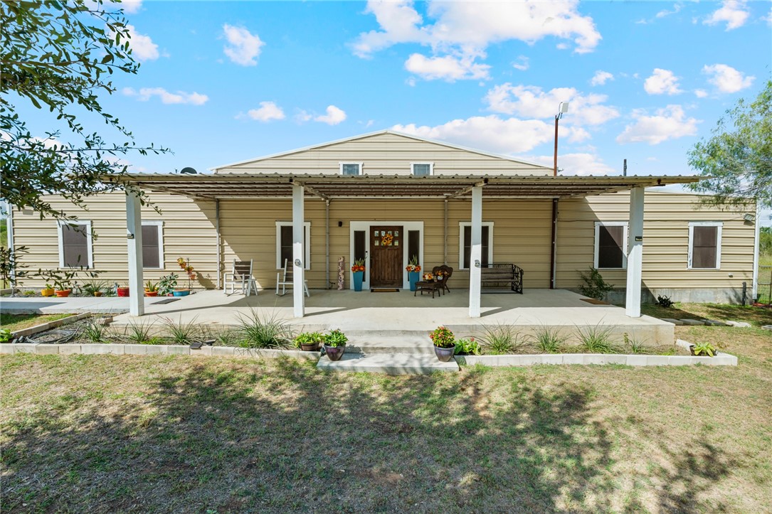1058 South Smith Street Hebbronville, TX 78361 - Photo 1 of 40 a view of a house with backyard and sitting area
