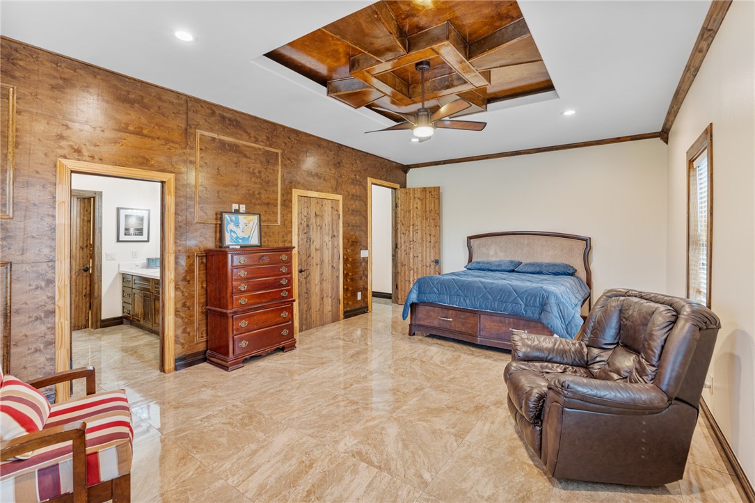 1058 South Smith Street Hebbronville, TX 78361 - Photo 17 of 40 a bedroom with furniture and wooden floor
