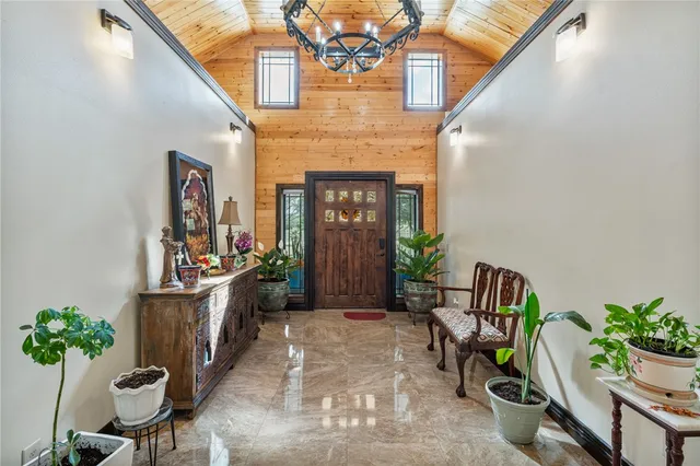 a view of two chairs in a patio
