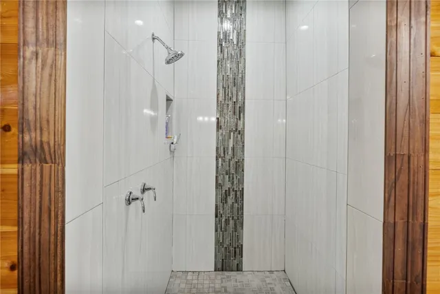a view of a dining room with furniture wooden floor and chandelier