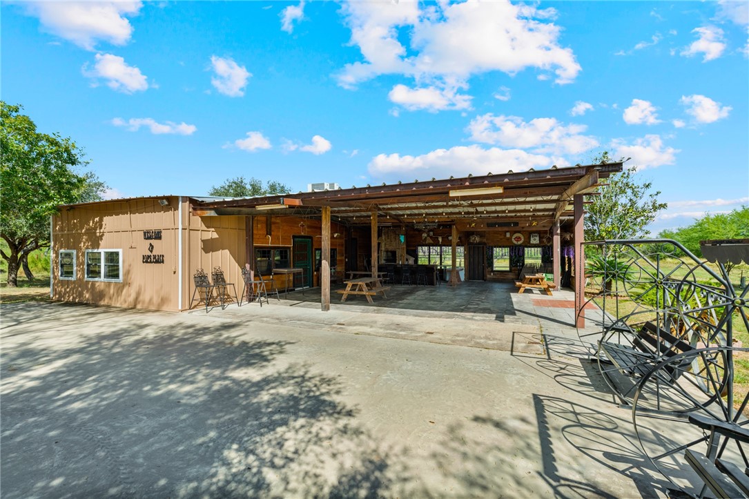 1058 South Smith Street Hebbronville, TX 78361 - Photo 36 of 40 a view of a house with backyard and sitting area