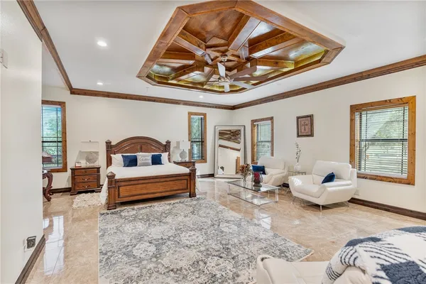 a bathroom with a tub sink and a mirror