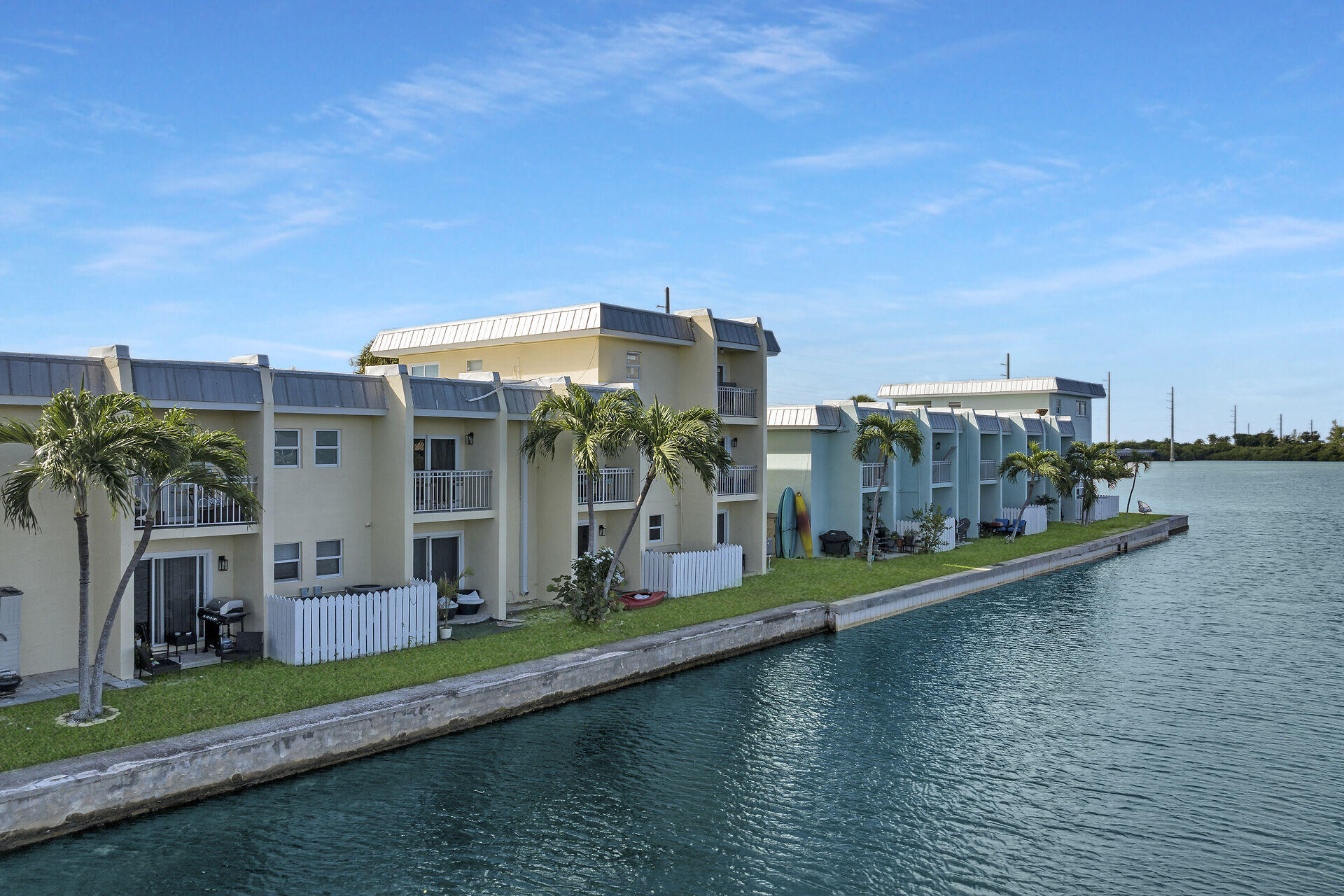 201 Coppitt Road, Unit 203B Key West, FL 33040 - Photo 12 of 44 a view of a house with a yard and lake view