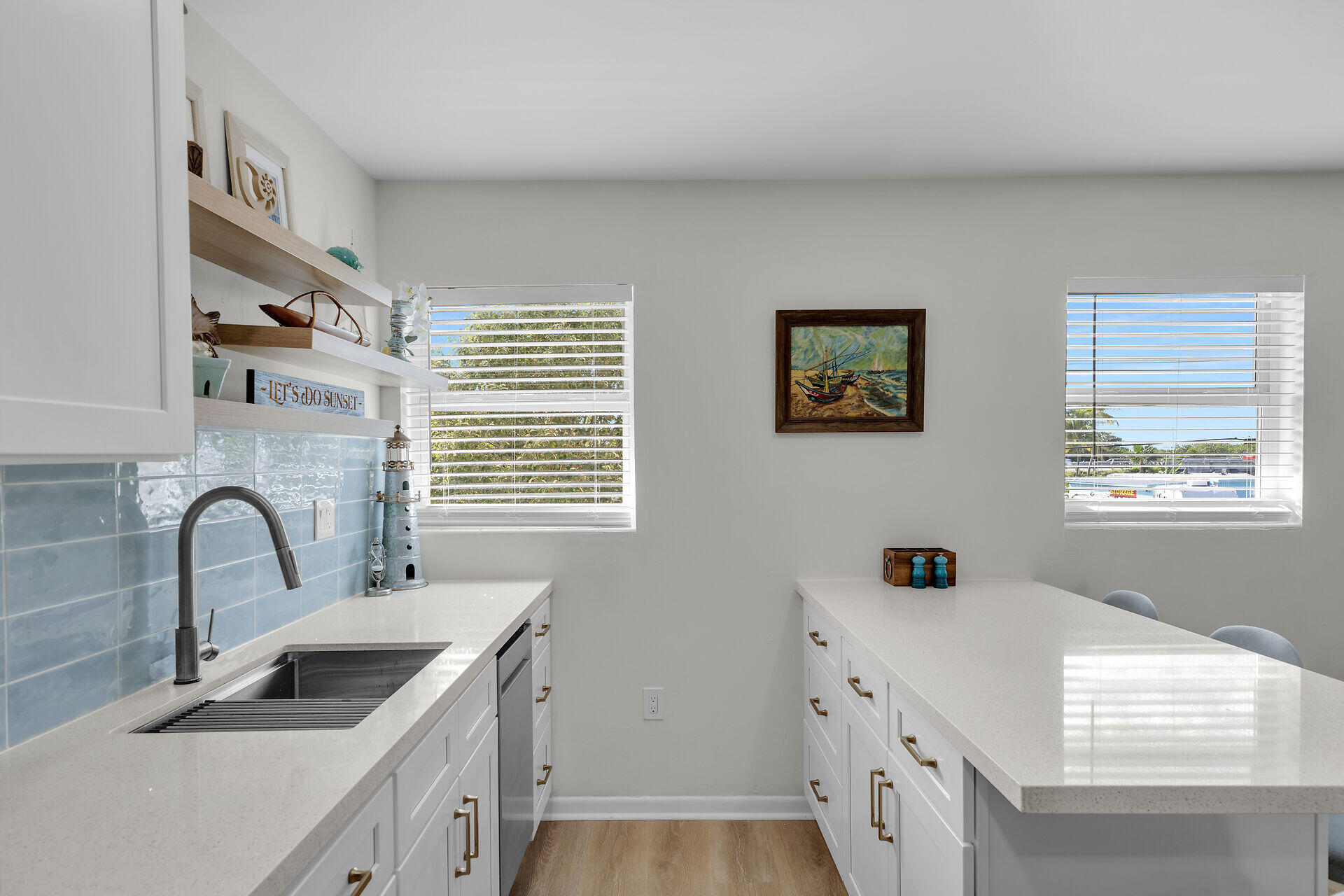201 Coppitt Road, Unit 203B Key West, FL 33040 - Photo 20 of 44 a kitchen with a sink a stove and cabinets