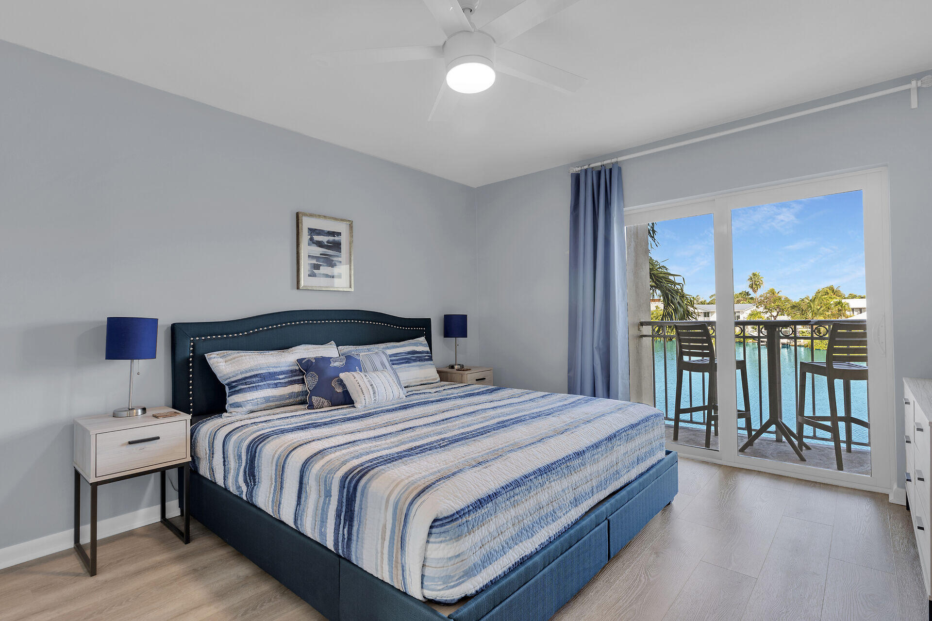 201 Coppitt Road, Unit 203B Key West, FL 33040 - Photo 27 of 44 a bedroom with a bed and a table