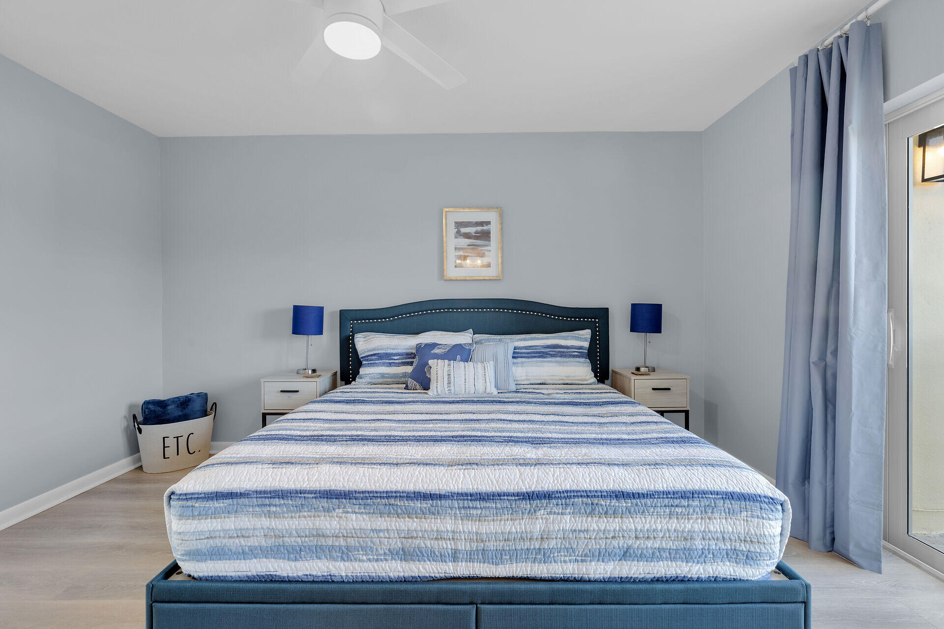 201 Coppitt Road, Unit 203B Key West, FL 33040 - Photo 29 of 44 a bedroom with a bed and a night stand