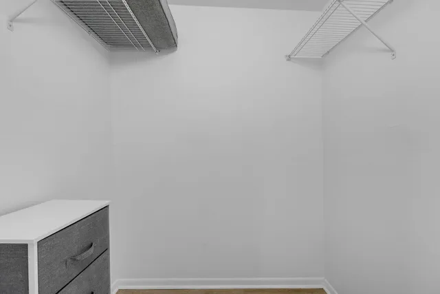 a view of small space with racks on the wall