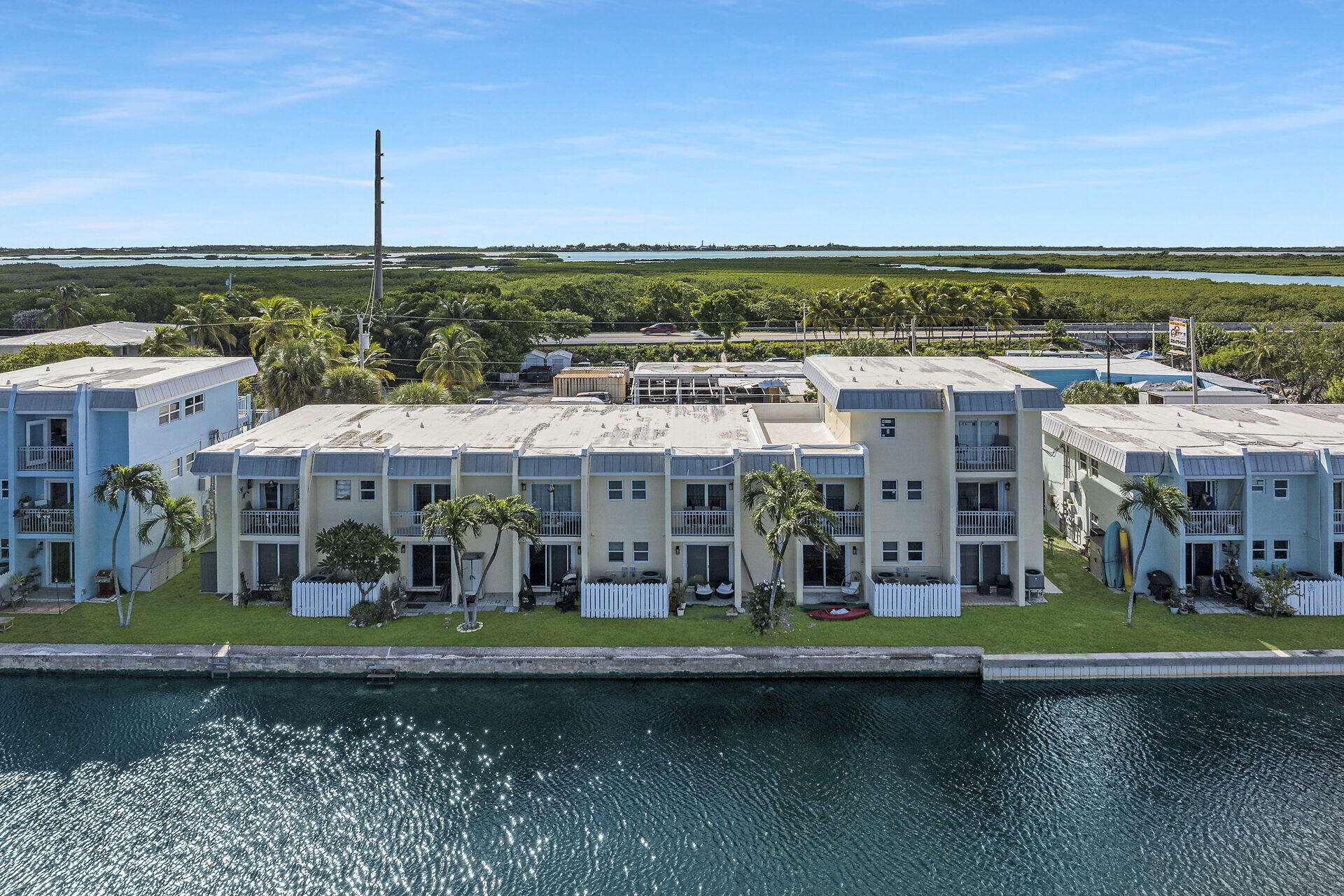 201 Coppitt Road, Unit 203B Key West, FL 33040 - Photo 7 of 44 an aerial view of a building with garden
