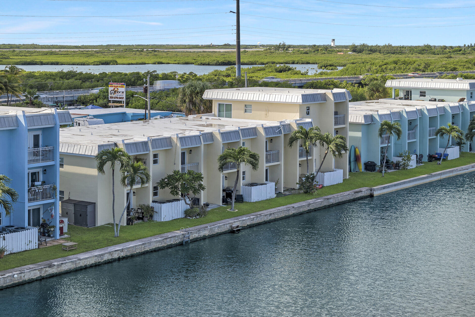 201 Coppitt Road, Unit 203B Key West, FL 33040 - Photo 9 of 44 an outdoor view of the building with yard