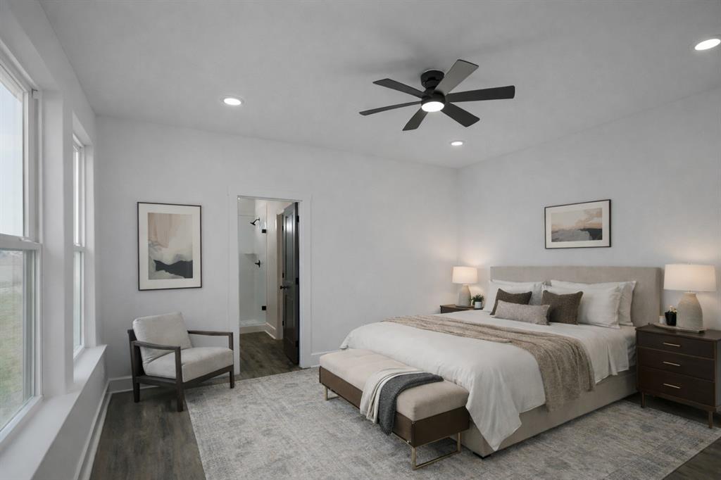 71 Arkansas Road Sadler, TX 76264 - Photo 18 of 35 a bedroom with a bed and a chandelier