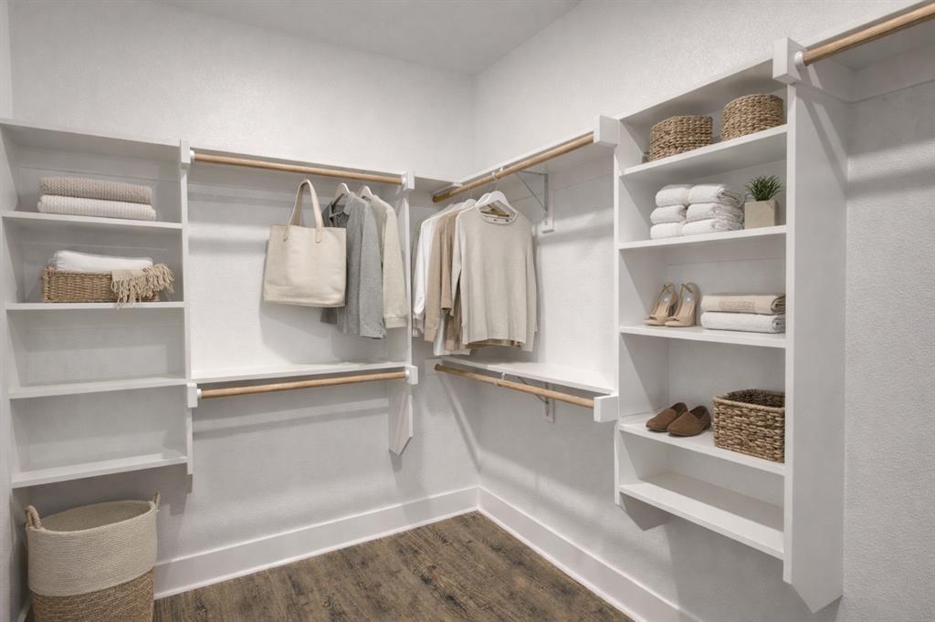 71 Arkansas Road Sadler, TX 76264 - Photo 20 of 35 a view of walk in closet with clothes and shoes