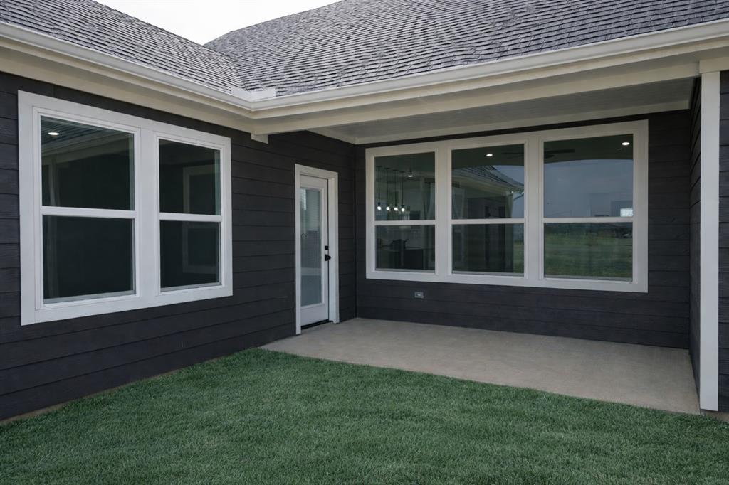 71 Arkansas Road Sadler, TX 76264 - Photo 25 of 35 a view of front door of a house with a large window