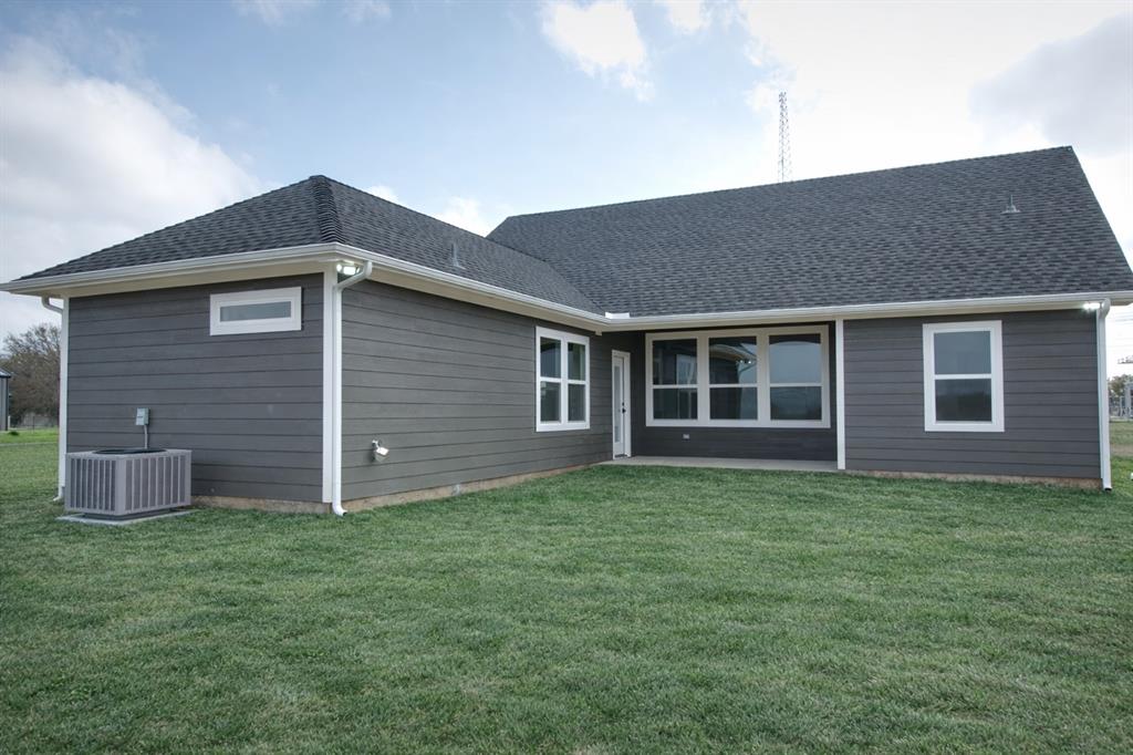 71 Arkansas Road Sadler, TX 76264 - Photo 26 of 35 a front view of a house with a yard