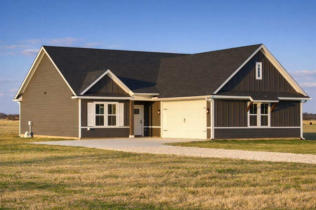 71 Arkansas Road Sadler, TX 76264 - Photo 28 of 35 a front view of a house with a yard