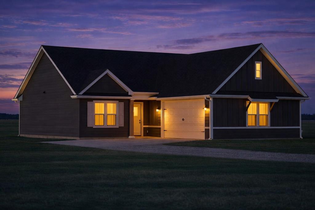 71 Arkansas Road Sadler, TX 76264 - Photo 33 of 35 a front view of a house with a yard