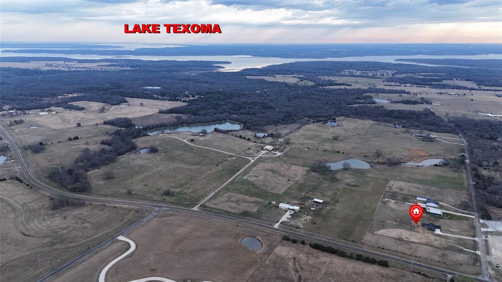71 Arkansas Road Sadler, TX 76264 - Photo 4 of 35 a view of city and street