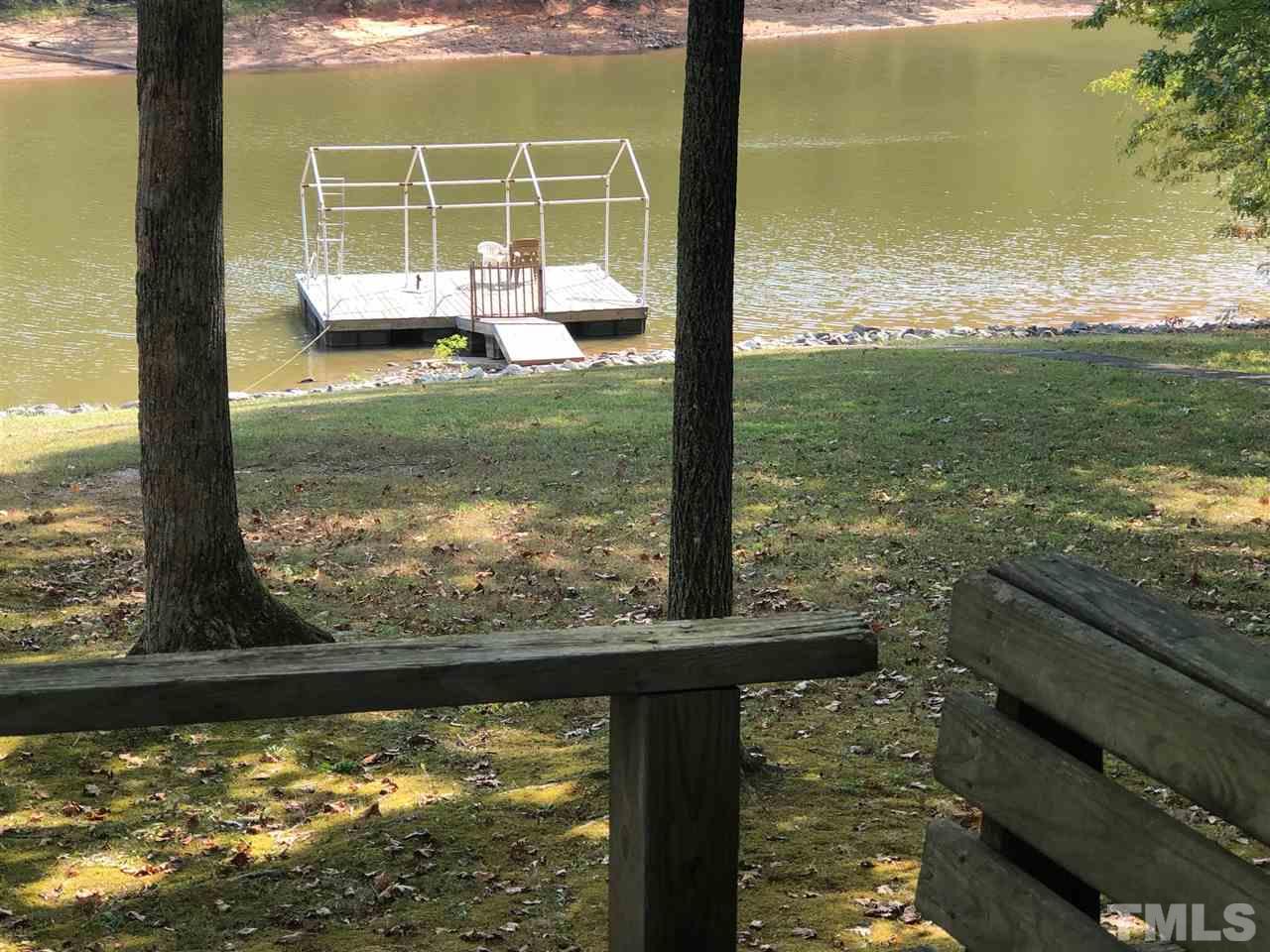 9546-9548 George Ruff Road Bullock, NC 27507 - Photo 1 of 25 a view of a lake from a window