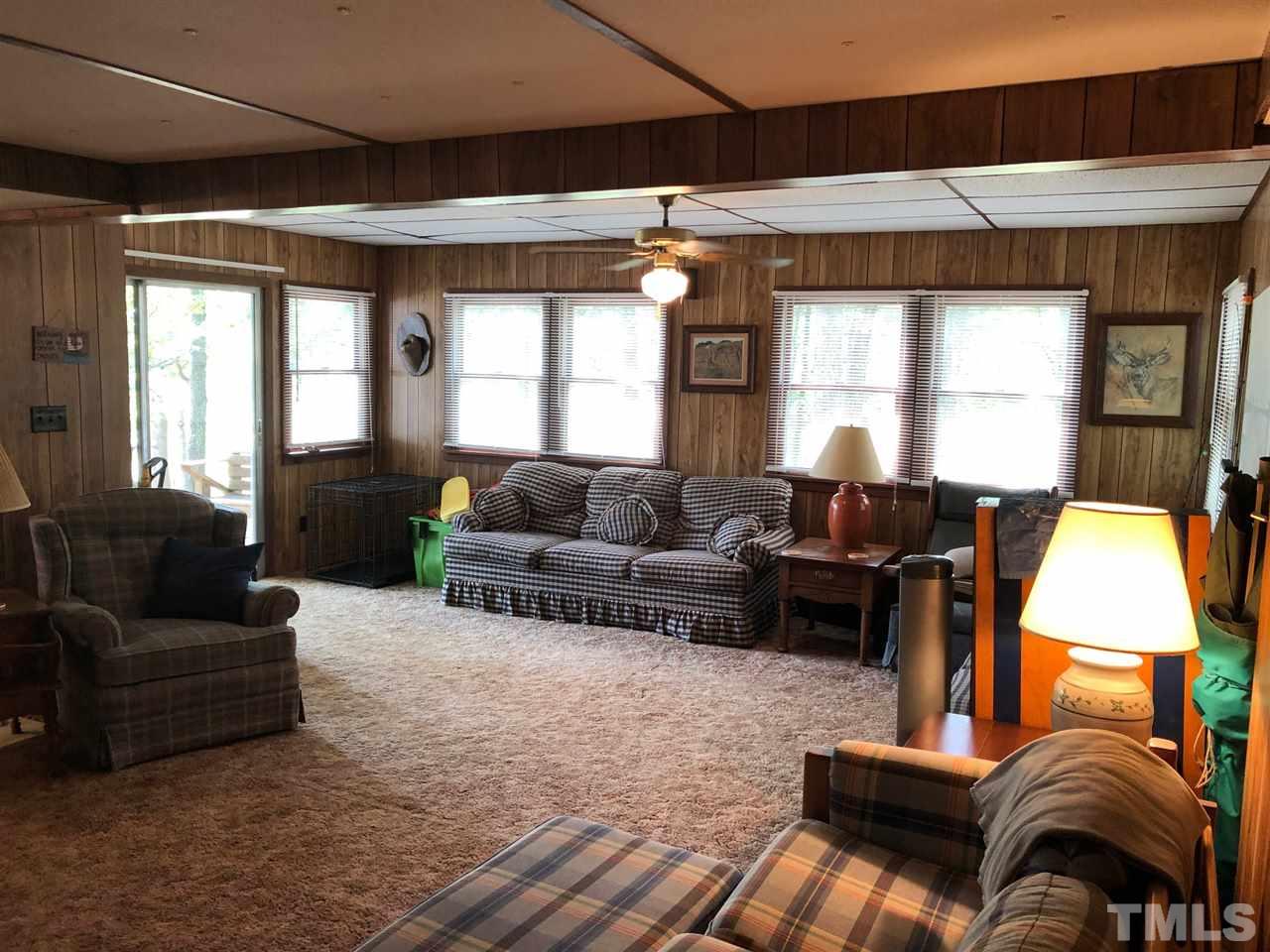 9546-9548 George Ruff Road Bullock, NC 27507 - Photo 5 of 25 a living room with furniture and a window