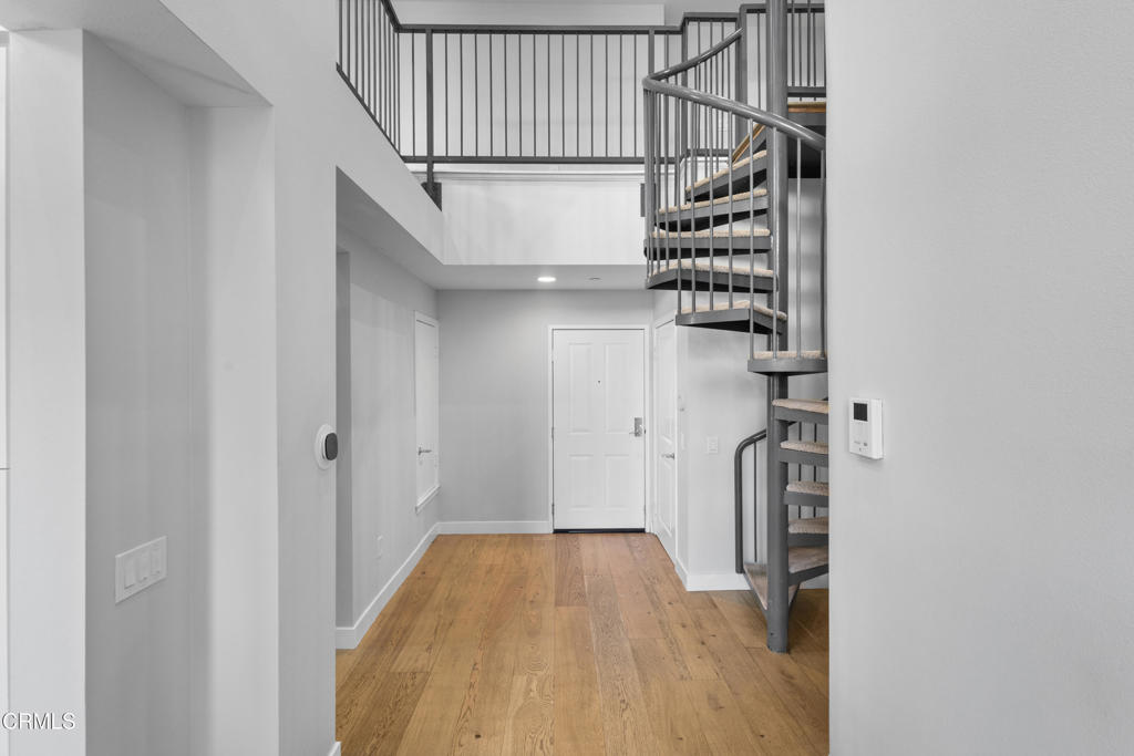 1901 South Victoria Avenue, Unit 204 Oxnard, CA 93035 - Photo 24 of 40 a view of entryway with wooden floor