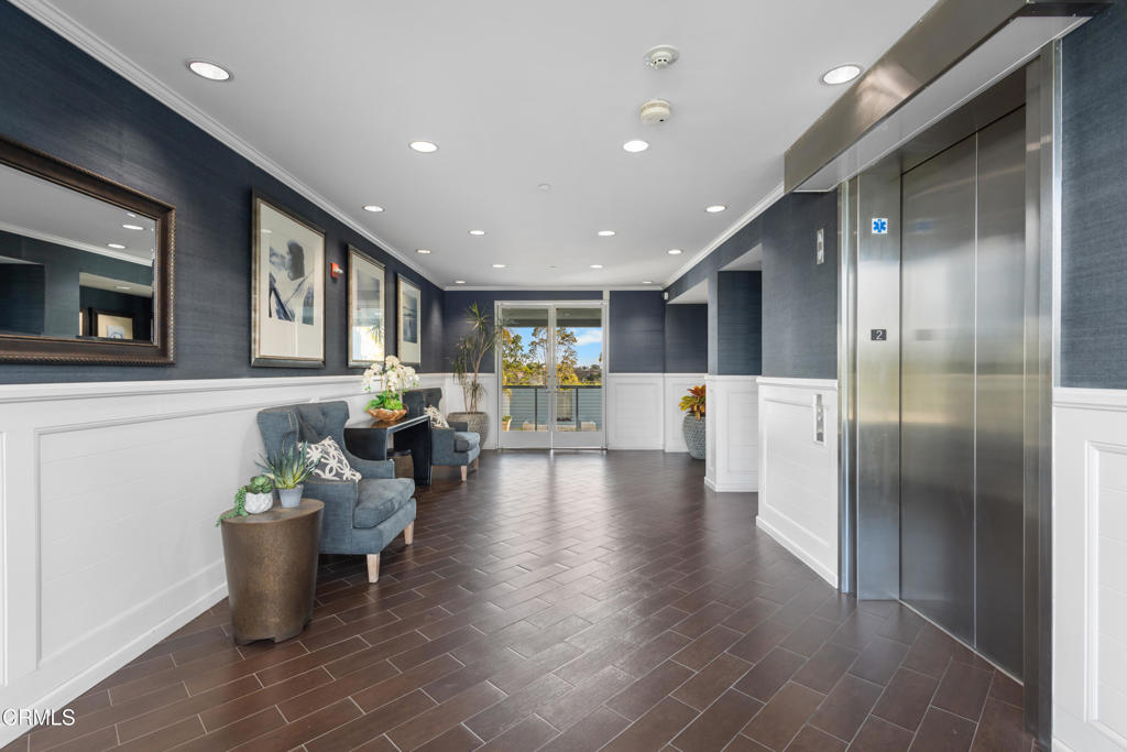 1901 South Victoria Avenue, Unit 204 Oxnard, CA 93035 - Photo 7 of 40 a lobby with furniture and a potted plant