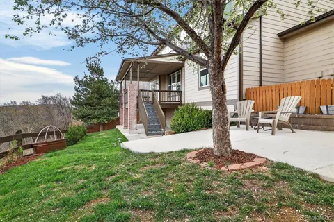 a picture of a cabinet with a floor in a white refrigerator