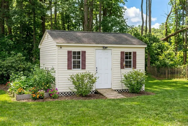 a view of a backyard of the house