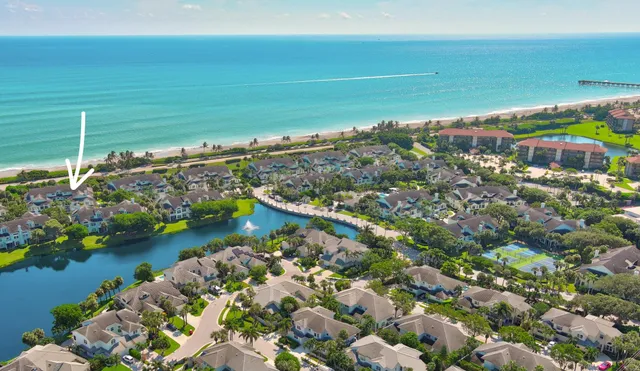 a view of a city with an ocean