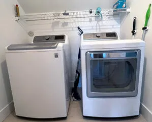 a stove top oven sitting inside of a kitchen