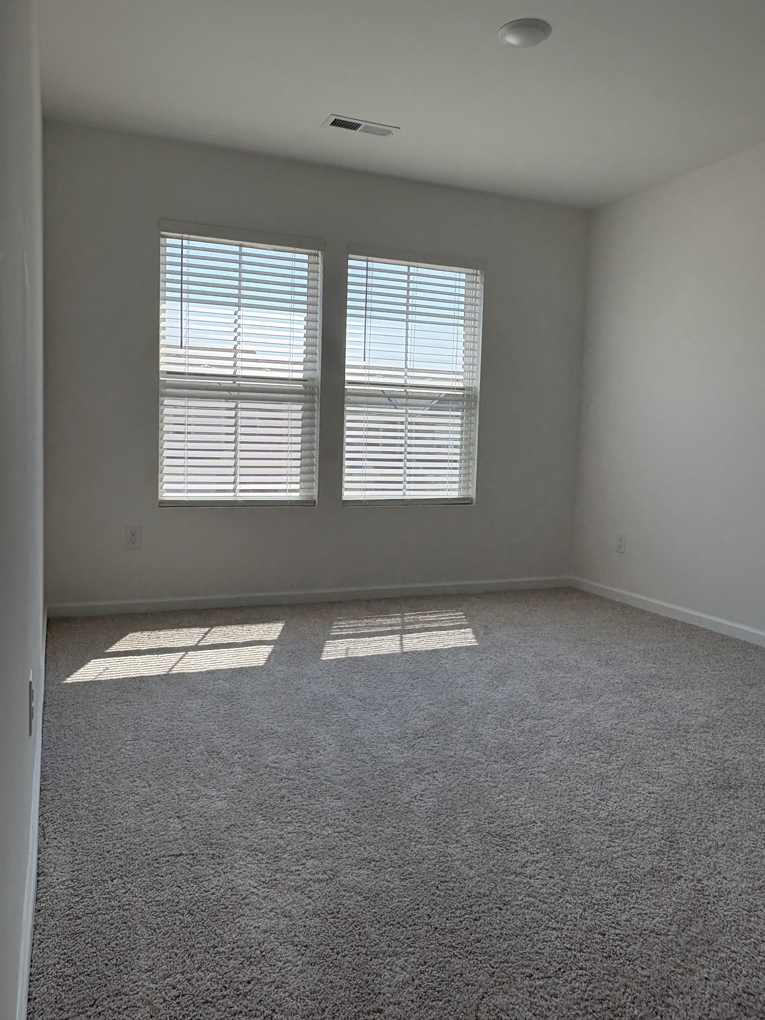7144 Mapleside Lane, Unit 19 Fairview, TN 37062 - Photo 24 of 26 an empty room with a empty space and windows