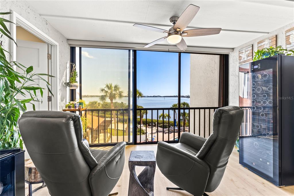 1602 Stickney Point Road, Unit 307 Sarasota, FL 34231 - Photo 17 of 56 a balcony with furniture