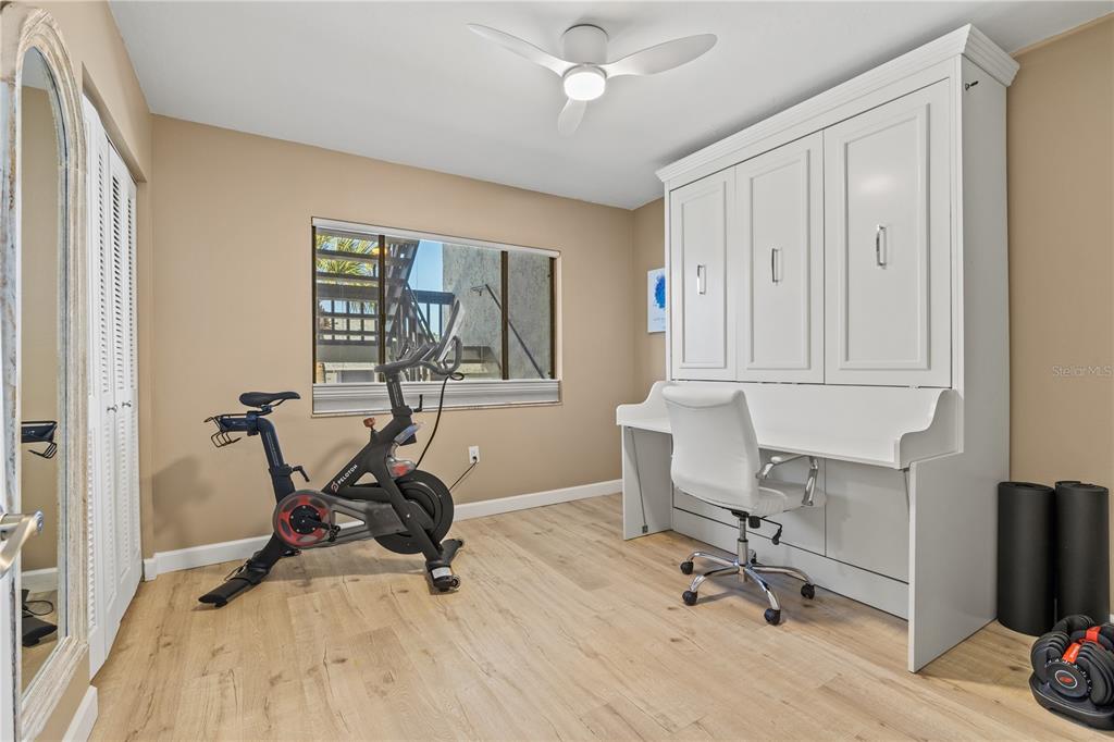 1602 Stickney Point Road, Unit 307 Sarasota, FL 34231 - Photo 28 of 56 a view of a workspace with furniture and a window