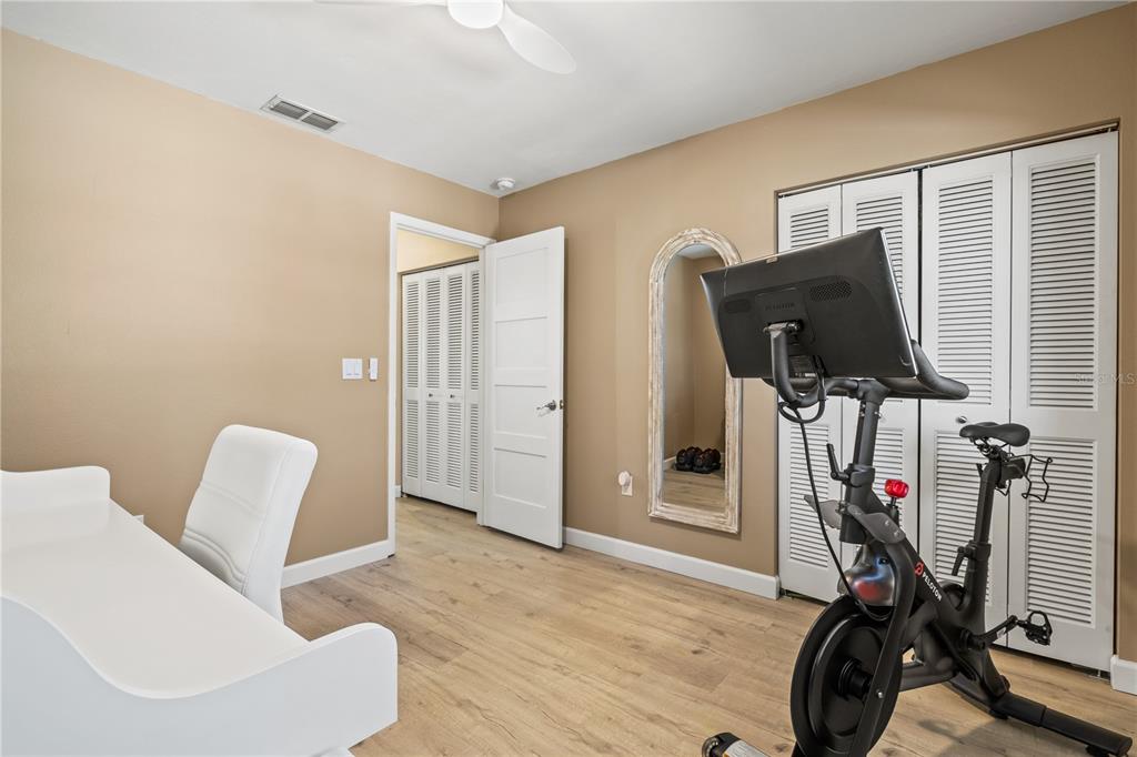 1602 Stickney Point Road, Unit 307 Sarasota, FL 34231 - Photo 29 of 56 a view of a room with gym equipment