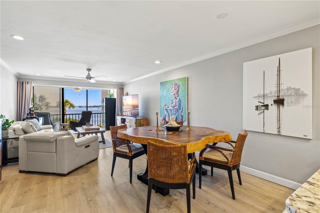 1602 Stickney Point Road, Unit 307 Sarasota, FL 34231 - Photo 10 of 56 a living room with furniture and a table