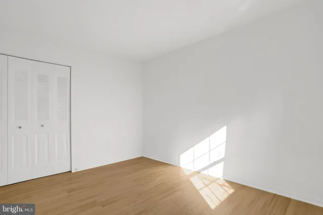 a view of staircase with white walls