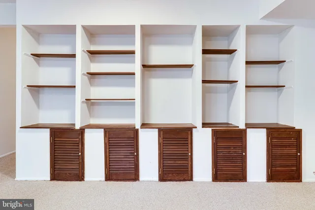 a view of a backyard with a tree