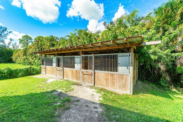 a bedroom with furniture and a fireplace