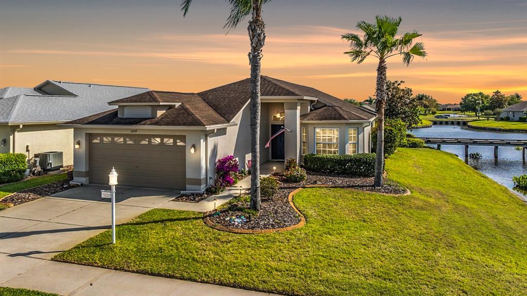a front view of a house with yard