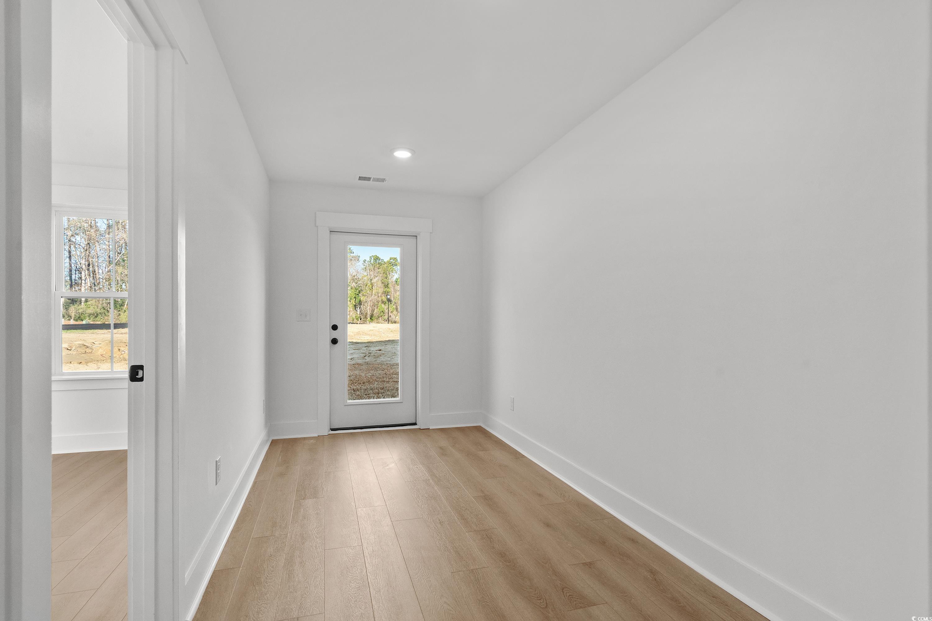 4414 Kingsport Road, Unit 1302 Little River, SC 29566 - Photo 40 of 40 Entryway featuring wood finished floors and recessed lighting