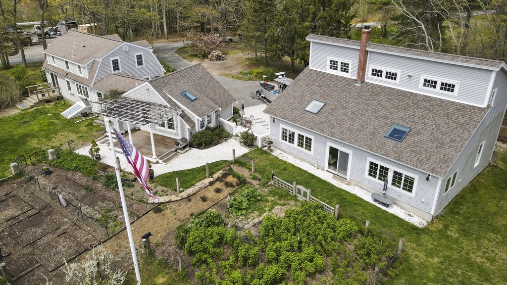 29 Back River Road Bourne, MA 02532 - Photo 3 of 37 aerial view of a house with pool and deck