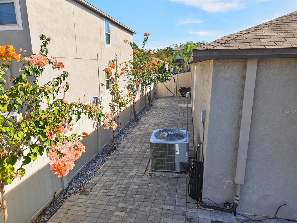 16751 Delia Street Wimauma, FL 33598 - Photo 24 of 36 a backyard of a house with outdoor seating