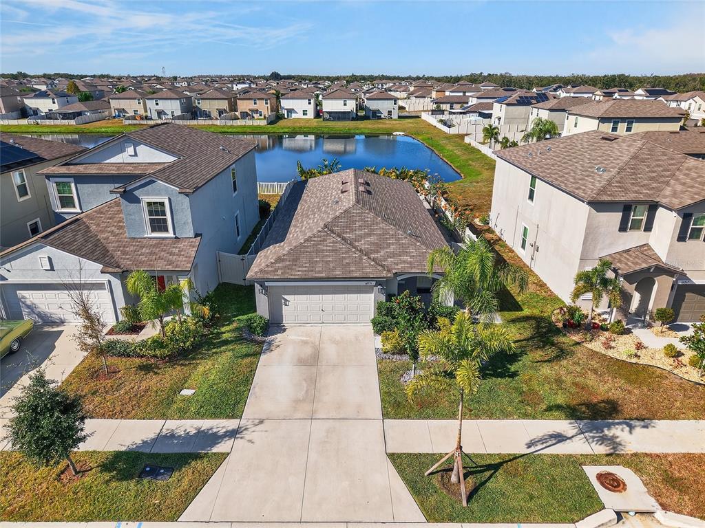 16751 Delia Street Wimauma, FL 33598 - Photo 30 of 36 a view of a city with tall buildings